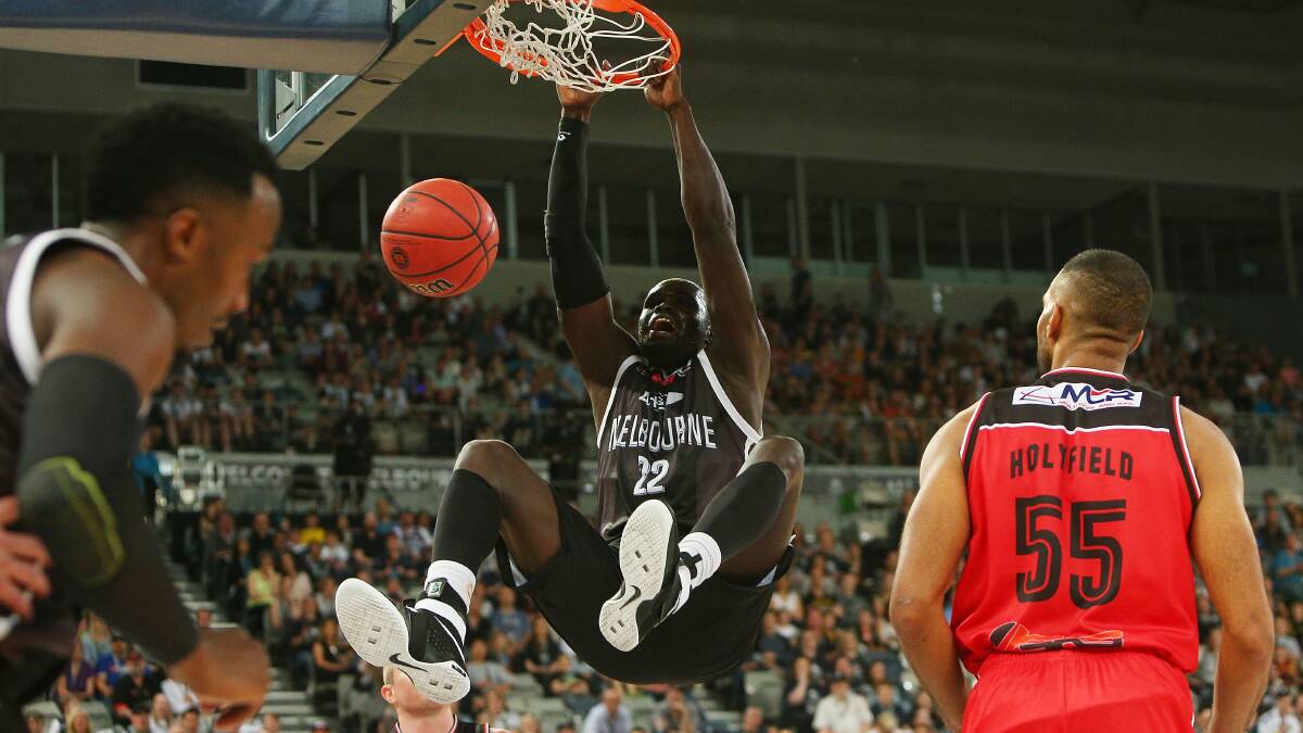 BOOM: Majok Majok slams it home. Picture: Getty Images