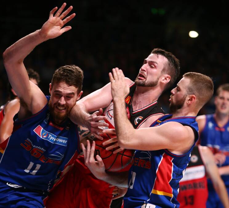 CHARGED: Both Eric Jacobsen (left) and AJ Ogilvy (right) have been cited by the NBL review panel in a fiery semi-final series. Picture: Getty Images