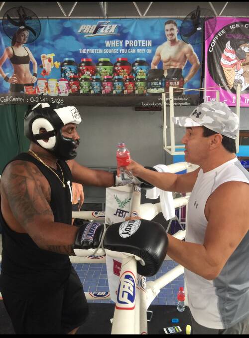 Johnny Krishna puts in the hard yards with Jeff Fenech in Thailand.