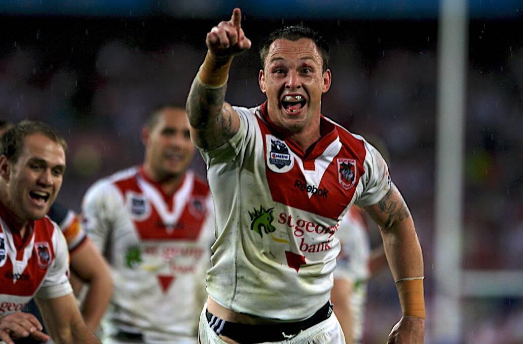 NICE: Nathan Fien celebrates his try in the Dragons 2010 grand final victory. Picture: Andy Zakeli