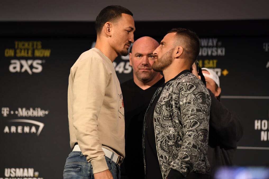 ALMOST HERE: Max Holloway and Alex Volkanovski go face to face. Picture: Getty Images