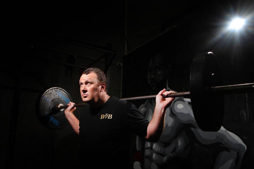 LOOKING UP: Andrew Webb will aim to lift 60,000 kilos in just one hour in a world record attempt aiming to raise funds for the Aspect South Coast School. Picture: Sylvia Liber. 