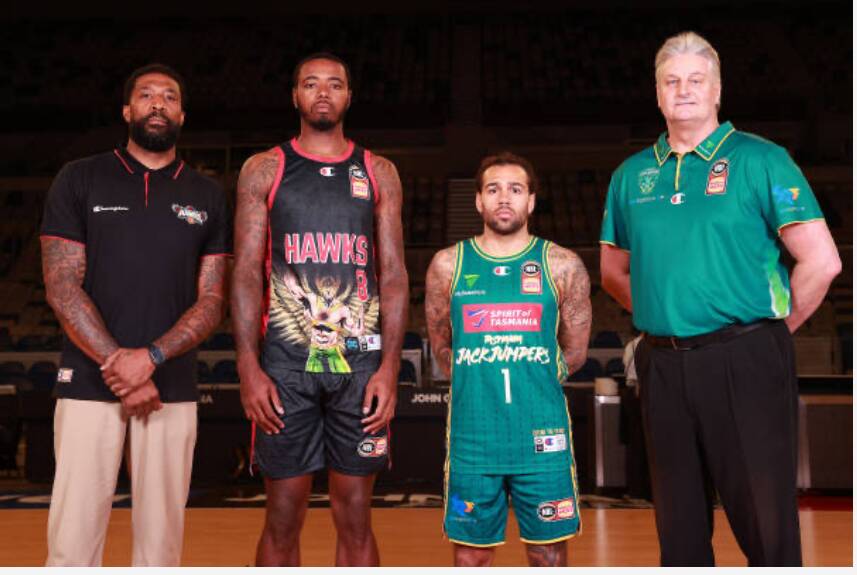 From left: Justin Tatum and Gary Clark (Hawks) launch the NBL playoffs alongside Jordan Crawford and Scott Roth (Tasmania). Picture Getty Images