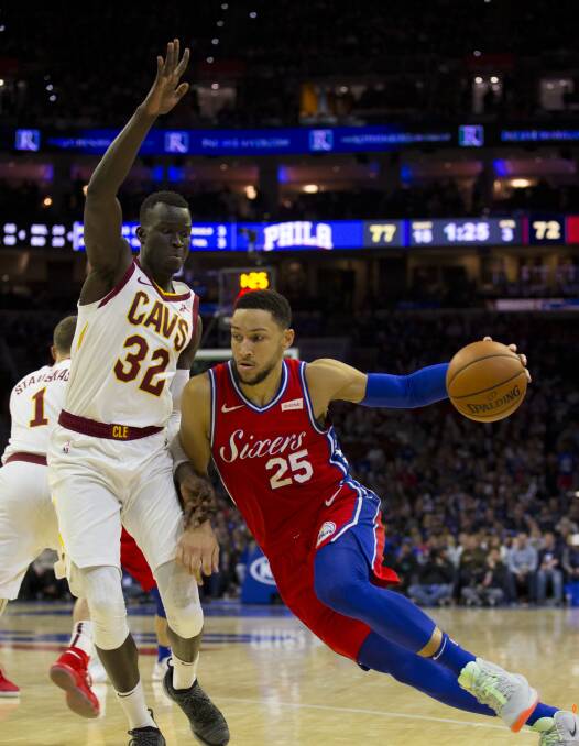 BIG STAGE: Deng Adel guards fellow Aussie Ben Simmons in one of his 19 appearances for the Cavs in 2019. Picture: Getty Images