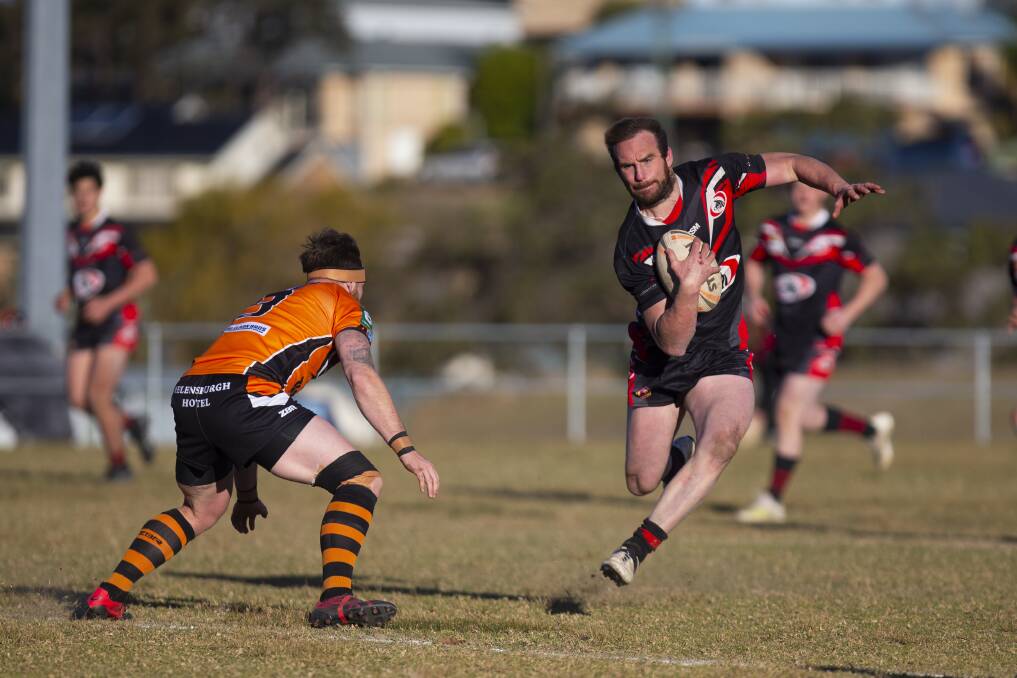 FLYING: Collegians back--rower Jarrod Thompson on the charge against Helensburgh on Saturday. Picture: Anna Warr
