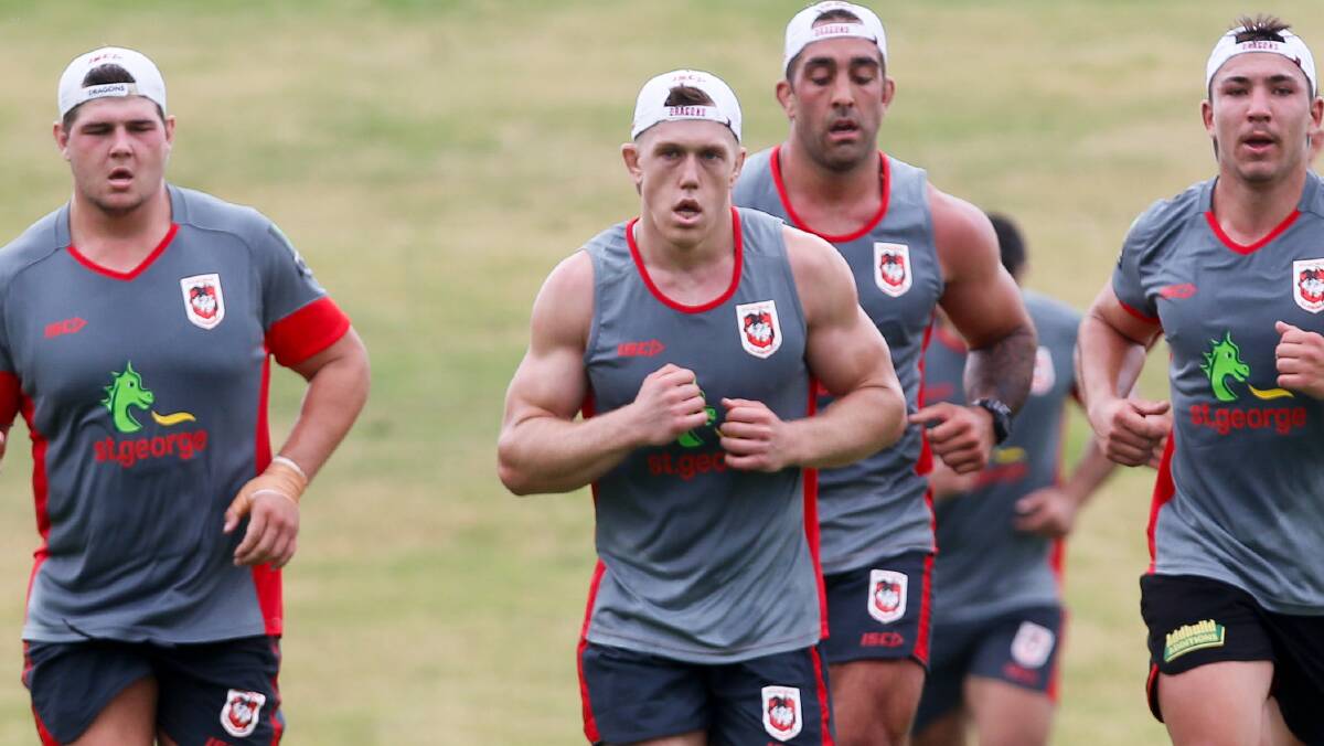 HARD YARDS: Cameron McInnes (centre) at Dragons training this week. Picture: Adam McLean