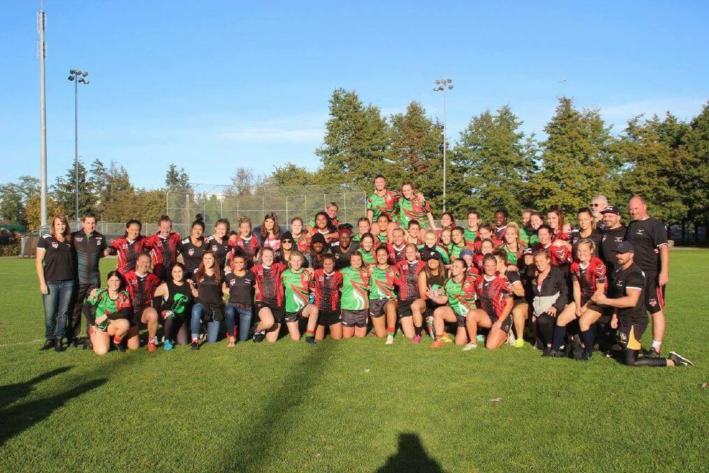 STRONG BOND: Canada and Corrimal after the first of two clashes in Vancouver last month. It played a vital role in the Ravens World Cup preparations.