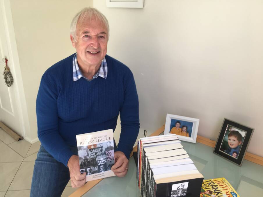 TOME: Tom Mather with his latest book The Nearly Men of Rugby League that chronicles the lives of 14 men who played for Australia without playing a Test match.