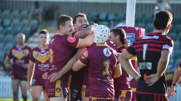 Shellharbour celebrate Brandon Webster-Mansfield's second try against Kiama on Sunday. Picture by Sylvia Liber