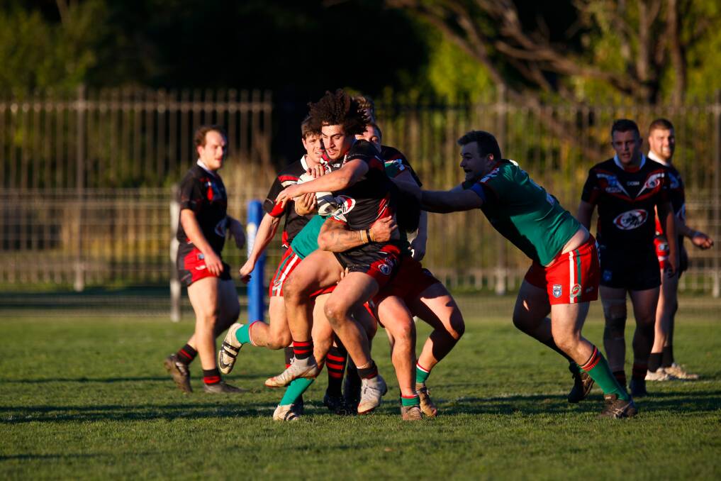 BATTLE: Collegians centre Donte Lusio takes it up against Corrimal on Saturday. Picture: Anna Warr