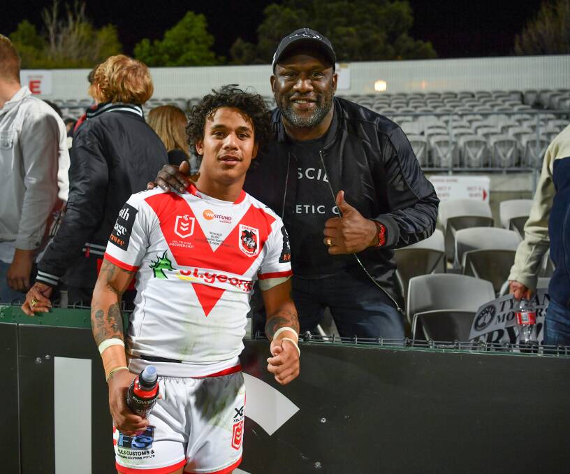LIKE FATHER LIKE SON: Tristan Sailor with dad, and dual-International, Wendell Sailor following his NRL debut against the Roosters on Saturday. Picture: NRL Photos