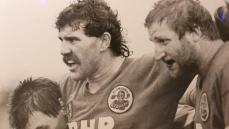 CAST IRON: Steelers great Michael Bolt (centre) produced an incredible run of 187 consecutive grade games between 1982-1990. 