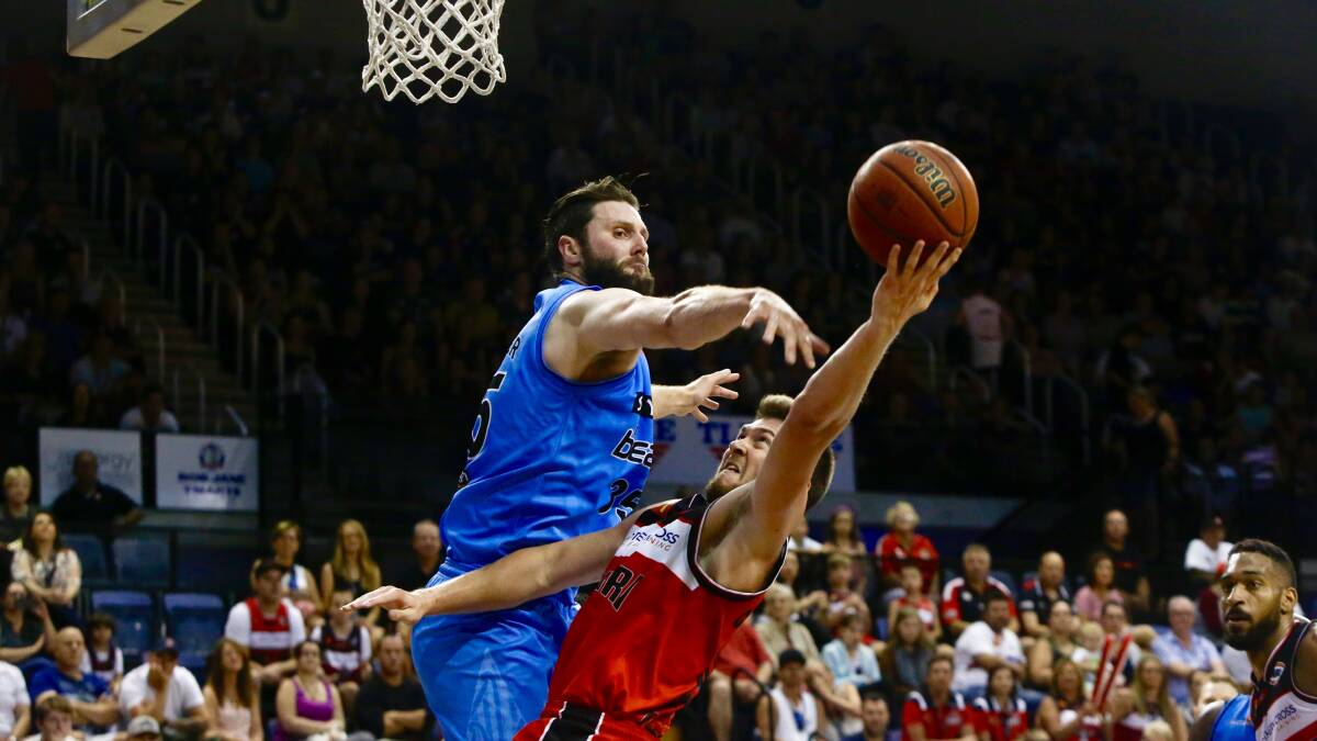 TOUGH LOSS: Rotnei Clarke drives to the basket in the Hawks 95-86 defeat to the Breakers on Friday night. Picture: Adam McLean