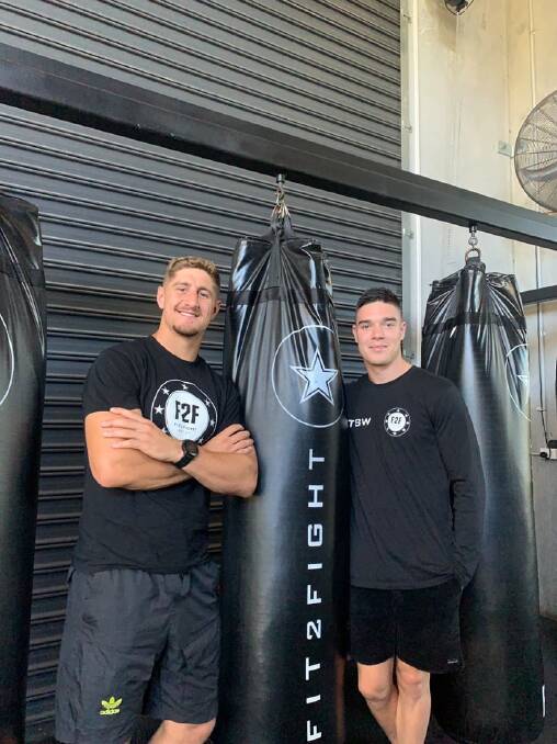 GAVE HIM A NUDGE: Dragons star Zac Lomax played a big role in Tyler Sargent-Wilson resuming his promising boxing career. Picture: supplied
