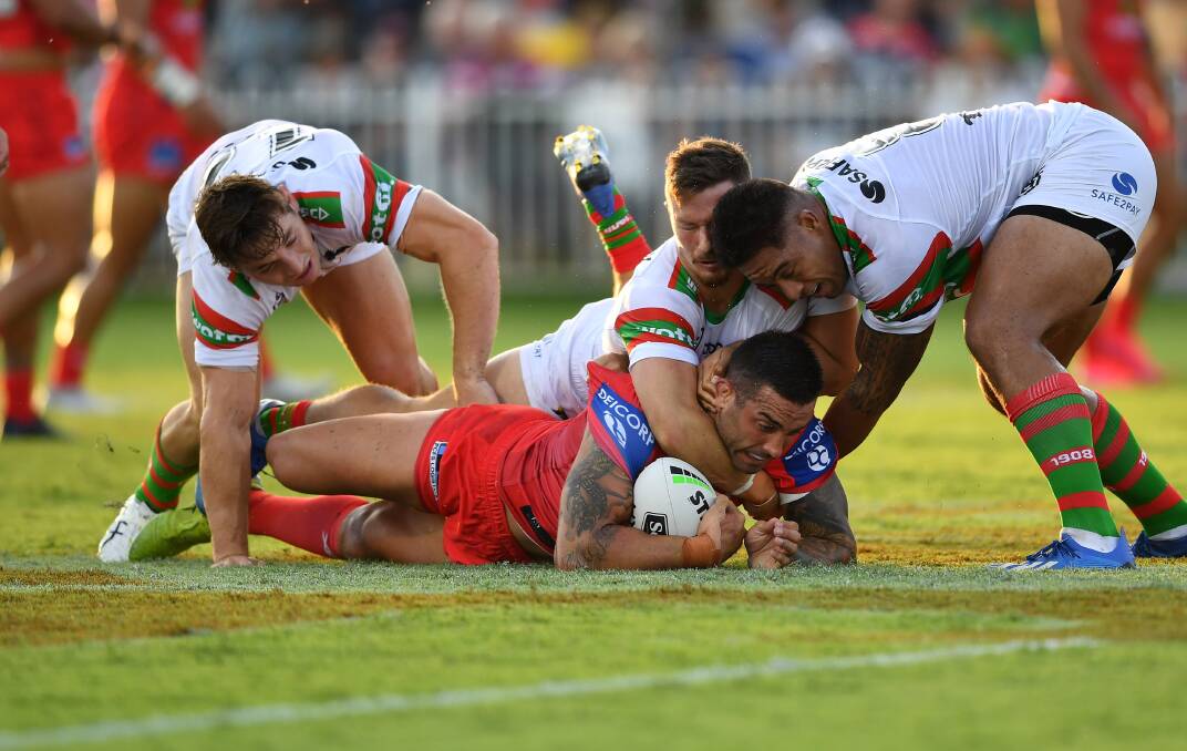 tough day: Paul Vuaghan does the tough stuff against the Rabbitohs on Saturday. Picture: NRL Photos