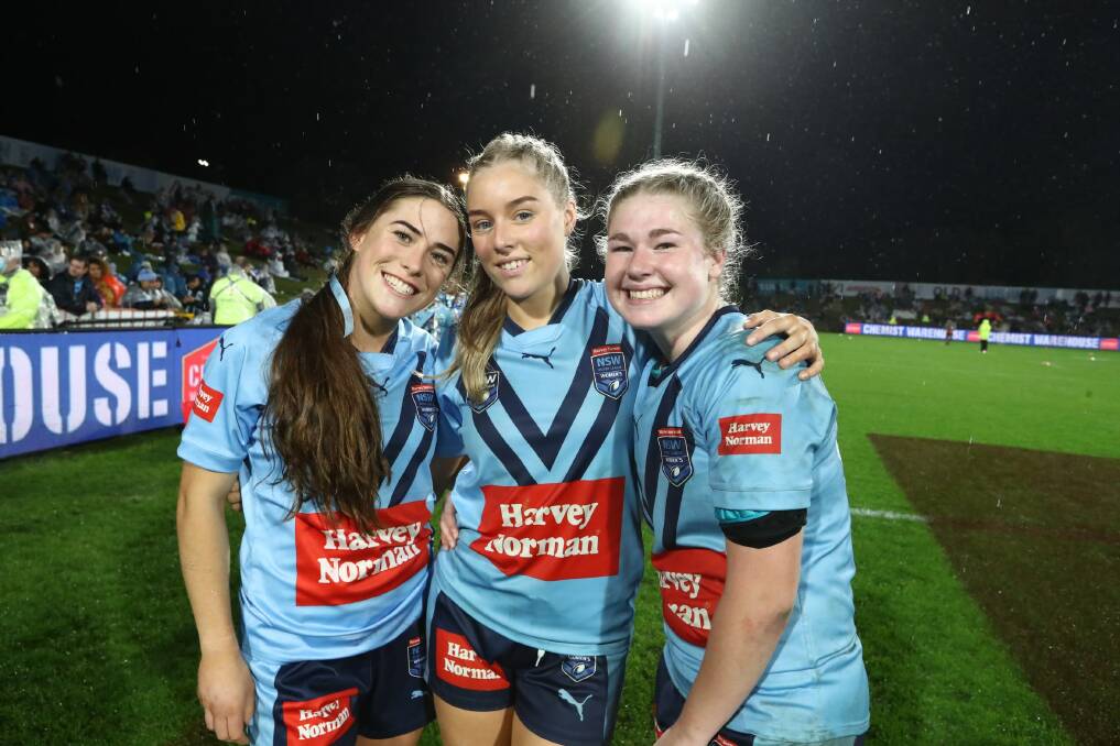 FLASH: Teagan Berry (centre), with Blues teammates Keele Brown and Lilly Baker, is making a habit of match-winning plays in big games. Picture: NRL Imagery
