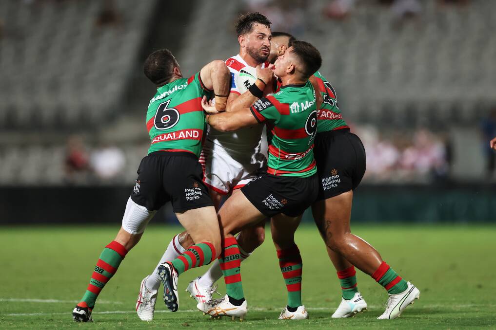 Jack Bird is mauled by the Rabbitohs defence on Saturday. Picture Getty Images