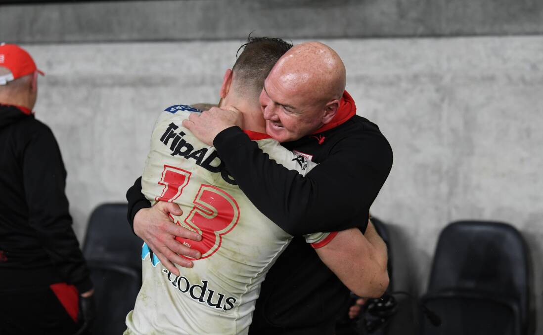 Dragons skipper Cam McInnes celebrates victory in outgoing coach Paul McGregor's last match in charge on Friday night. Photo: NRL Imagery