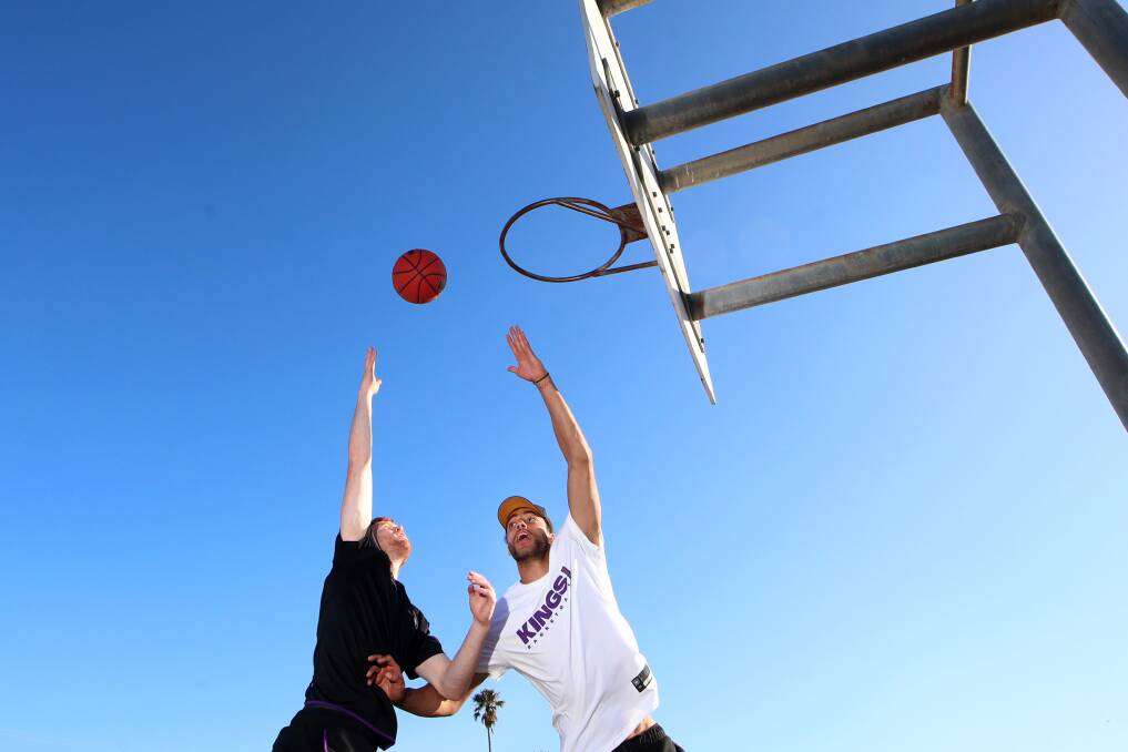 REACHING FOR THE SKY: Illawarra fans growing up, Angus Glover and Xavier Cooks are now plotting championship glory with the Kings. Picture: Sylvia Liber