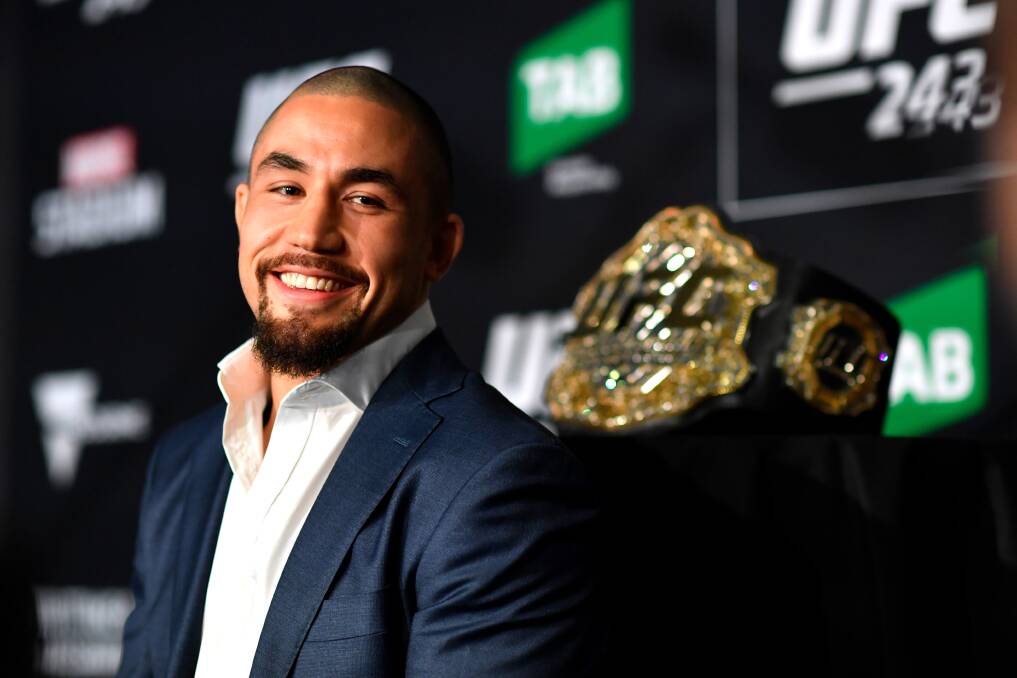 PHILOSOPHICAL: "Sometimes you lose, sometimes you get knocked down, but I got there once and I know what I need to do to get there again." UFC star Robert Whittaker's nation-wide speaking tour comes to Wollongong in December. Picture: Getty Images