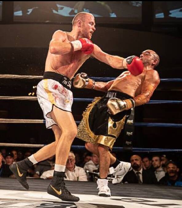 WAR: Mark Lucas went 12 brutal rounds with former IBF middleweight champion Sam Soliman in Melbourne. 