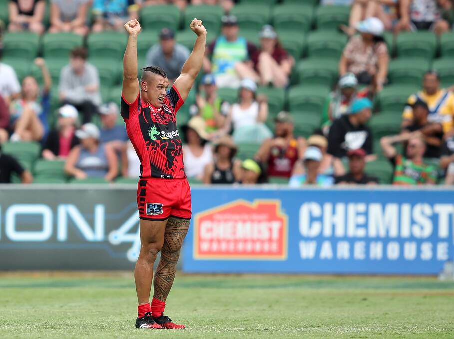 PUTTING HIS HAND UP: Tyrell Fuimaono will start on the Dragons right edge on Friday. Picture: NRL Photos