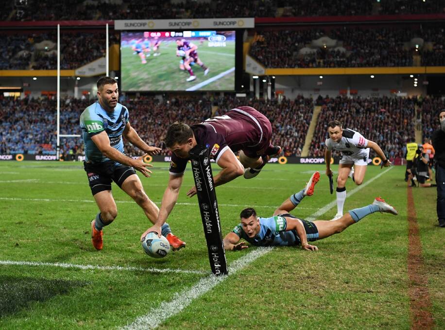 NICE FINISH: Corey Oates grabs a crucial second-half try in the Maroons 18-14 win over NSW on Wednesday night. Picture: NRL Imagery