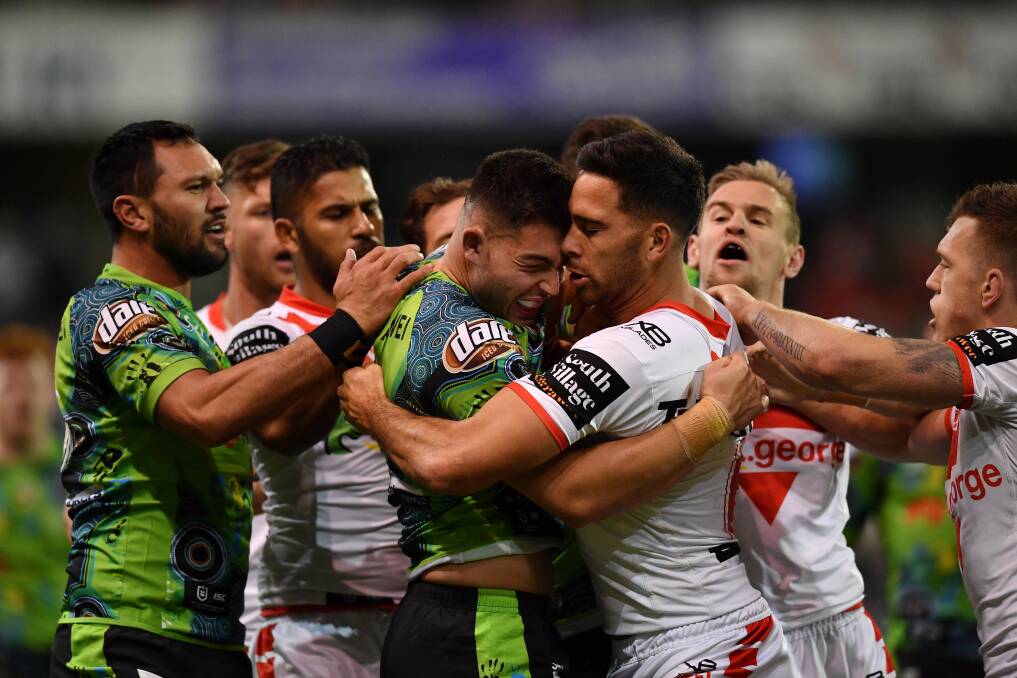 OUCH: A scuffle ensues following Nick Cotric's tackle on Tim Lafai that saw him sent from he field on Sunday night. Picture: NRL Photos