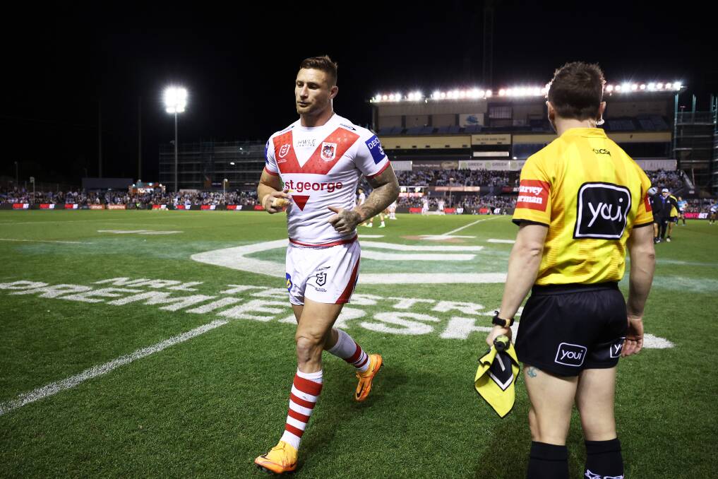 GONE: Tariq Sims leaves the field after being sin-binned in the Dragons clash with Cronulla on Saturday. Picture: Getty Images