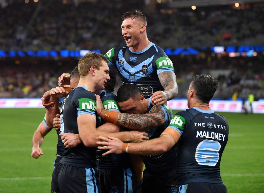 DAGGER: NSW celebrate Tom Trojevic's second try. Picture: NRL Photos