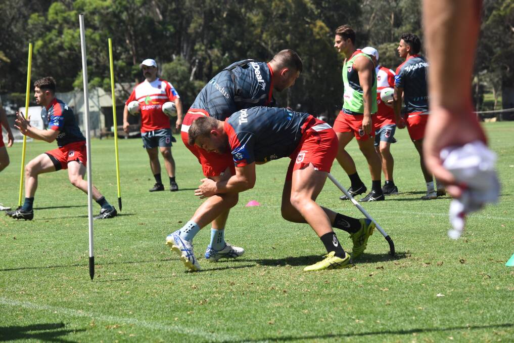 HARD SLOG: Dragons prop Kaide Ellis (right) says preseason torture sessions still beat being on the tools. Picture: Dragons Media