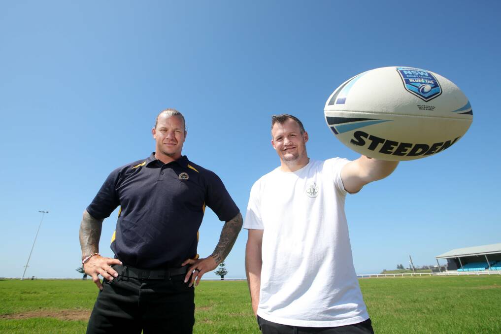 HOME-GROWN: Group Seven football operations manager Ashton Sims and fellow South Coast product Josh Morris. Picture: Sylvia Liber 