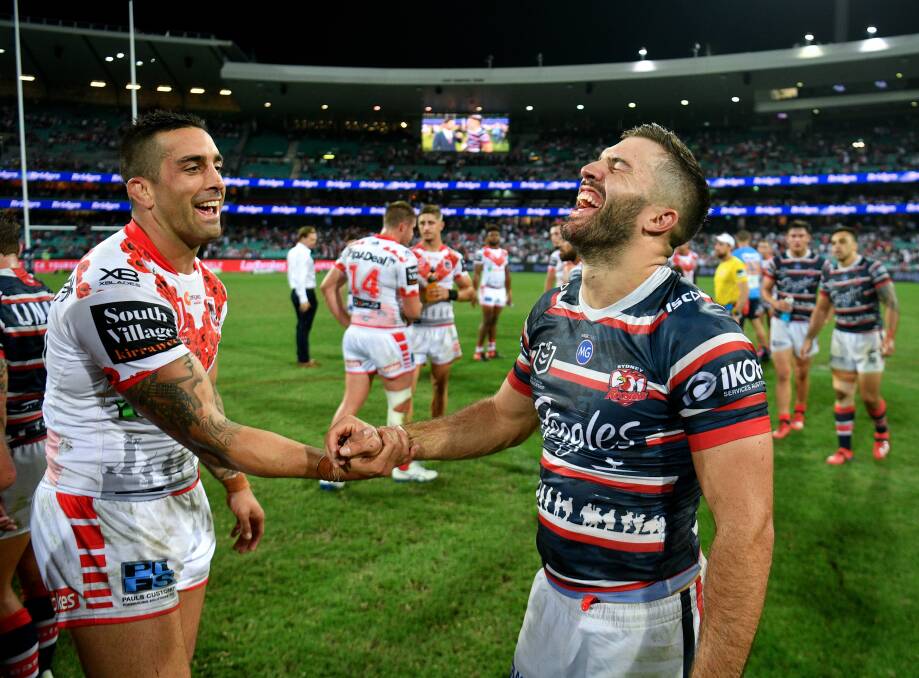 NEXT TIME: Paul Vaughan shares a laught with James Tedeso after last week's Anzac Day game. Picture: NRL Imagery