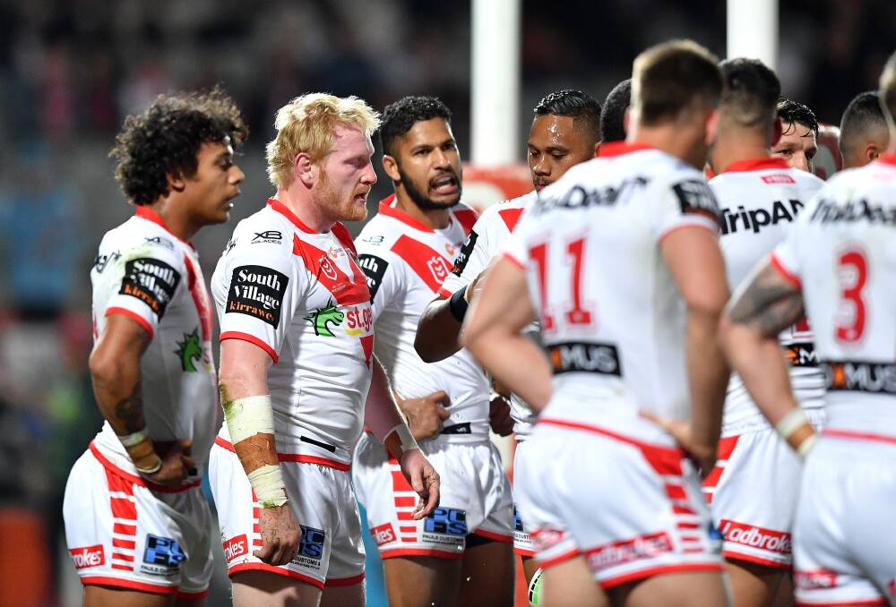DEJECTED: The Dragons had no answers against the Roosters on Saturday night. Picture: NRL Photos