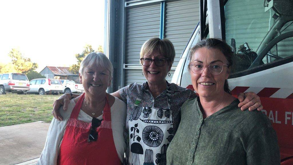 HELPING HAND: Darlow residents Deb Sturt, Kate Ludford and Jacinta Elphic helped to make their Fire Shed Fridays a reality.