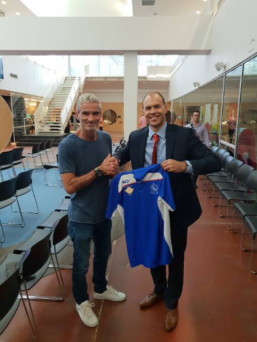 DONE DEAL: Former Socceroo Craig Foster with Albion Park City FC's Adrian Arciuli. 