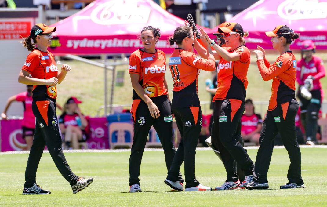 PLENTY TO CELEBRATE: The Perth Scorchers celebrate taking another wicket during their convincing win over the Sydney Sixers in Wollongong. Picture: ADAM McLEAN