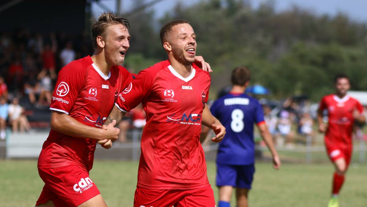 PLENTY TO SMILE ABOUT: Wolves striker Thomas James (right) scored a hat-trick in their win over APIA Leichhardt Tigers. Picture: PEDRO GARCIA
