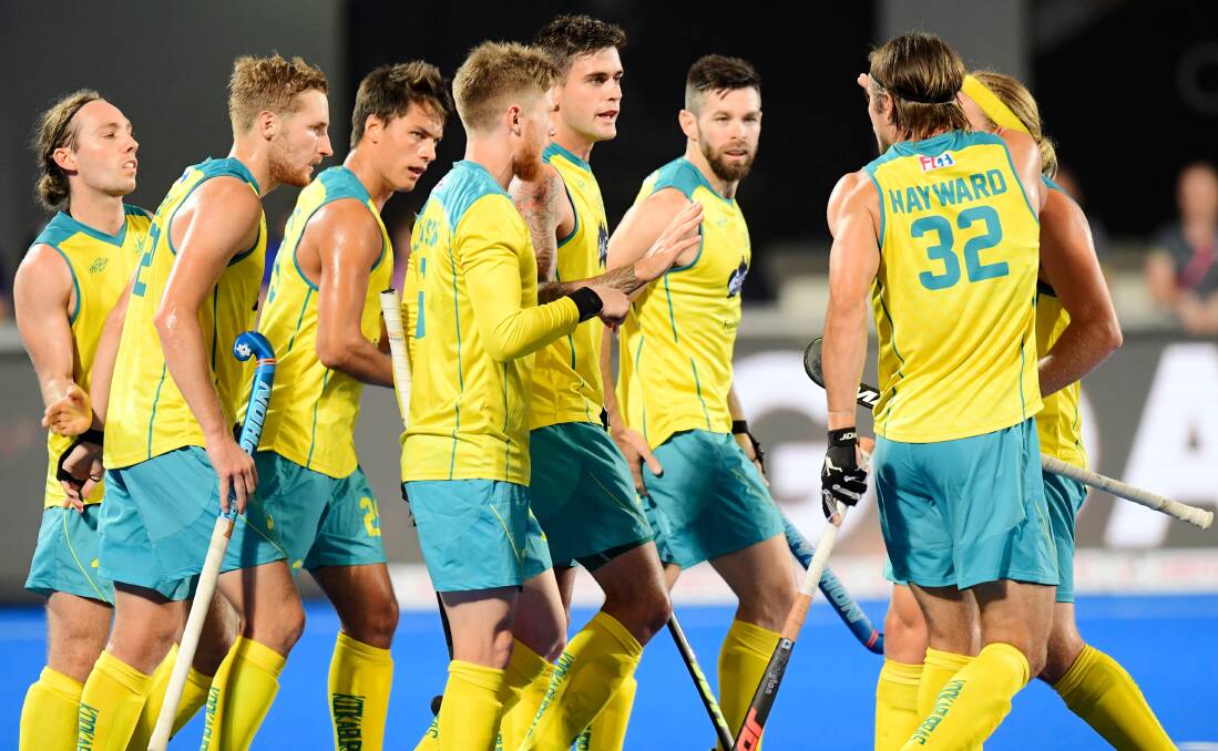 ON TARGET: Albion Park's Blake Govers (centre) scored for the Kookaburras at the World Cup. Picture: WORLD SPORT PICS