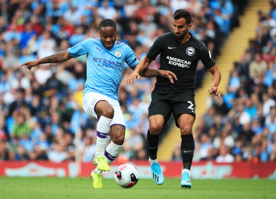 Big time: Tomer Hemed, playing for Brighton and Hove Albion, takes on Manchester City's Raheem Sterling last season. Picture: Matt McNulty - Manchester City/Manchester City FC via Getty Images
