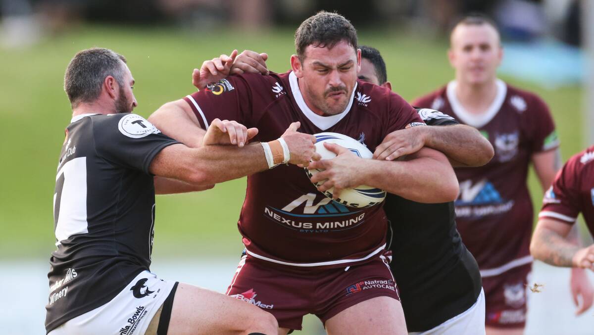 Take me on: Albion Park's Rodney Coates takes the ball up in Sunday's victory over Shellharbour. Picture: Anna Warr