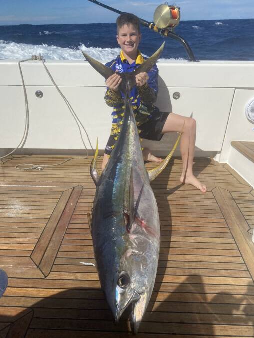 Top effort: Young Coby Rogers with his winning 45kg yellowfin from last week's Kiama Game competition.