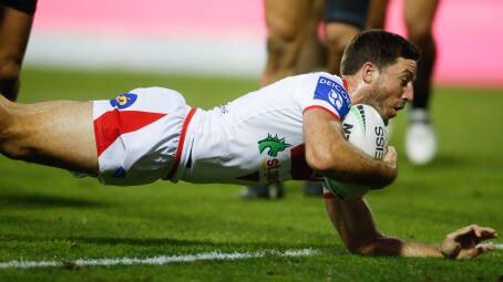 Try time: Ben Hunt scores for the Dragons on Sunday. Picture: Anna Warr