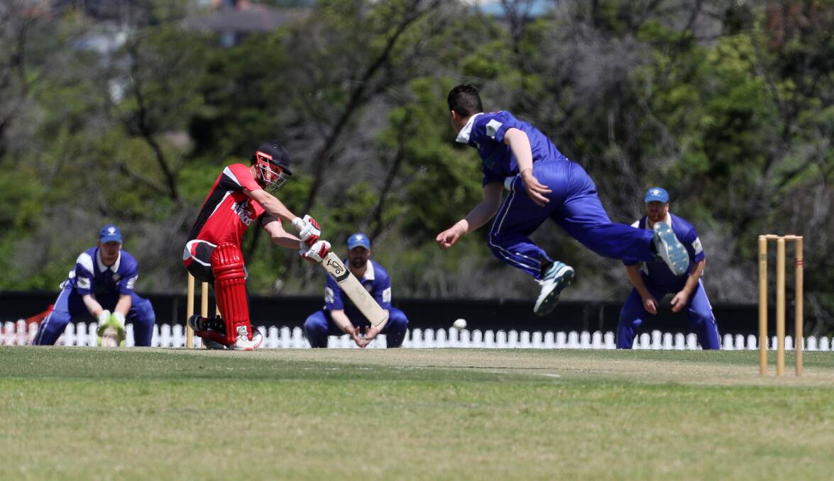 On the front foot: Brett Gilly drives for The Rail against Shellharbour earlier this season. Picture: Robert Peet