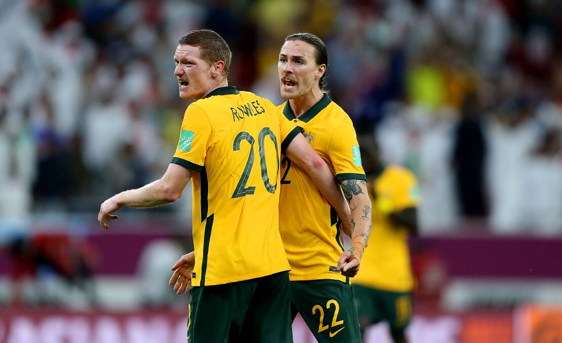 Green and bold: Jackson Irvine and Kye Rowles during Australia's World Cup playoff victory over United Arab Emirates. Picture: Mohamed Farag/Getty Images
