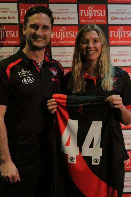 Fly: Essendon's Brendan Major and Maddy Collier. Picture: Bombers Media