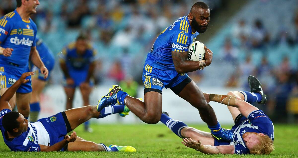 Carnage: Semi Radradra makes a break for Parramatta. The Eels have been stripped of 12 competition points for salary cap breaches. Picture: Getty Images