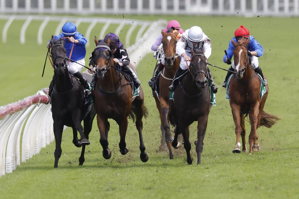 Scraping paint: Nash Rawiller on Kementari (left) hits the rails on the way to winning the Group 3 Hall Mark Stakes ahead of Count De Rupee (white colours) at Royal Randwick on Saturday. Picture: Mark Evans/Getty Images