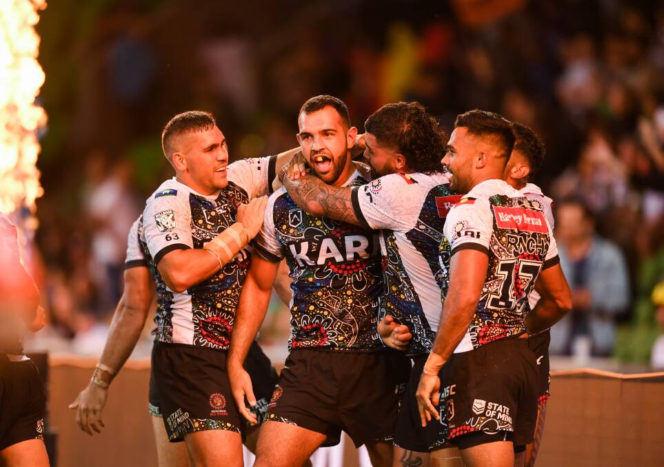 All-star moment: Josh Kerr celebrates scoring a try for the Indigenous team against the Maori this year. Picture: Nathan Hopkins/NRL Imagery