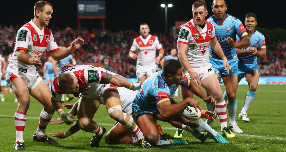 Trading places: Nene Macdonald scores for the Titans, but St George Illawarra will be hoping to see more of it in red and white next year. Picture: Getty Images